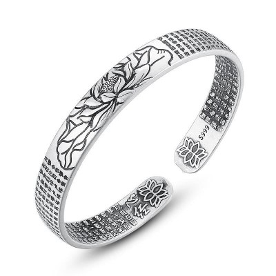 The lotus symbolizes enlightenment, wisdom, and spiritual growth