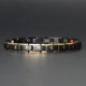 The Mani mantra enhances healing, while Germanium Titanium promotes energy protection
