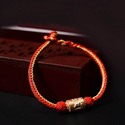 The red string is a symbol of protection, warding off negative energy, and attracting good fortune The red string is a symbol of protection, warding off negative energy, and attracting good fortune