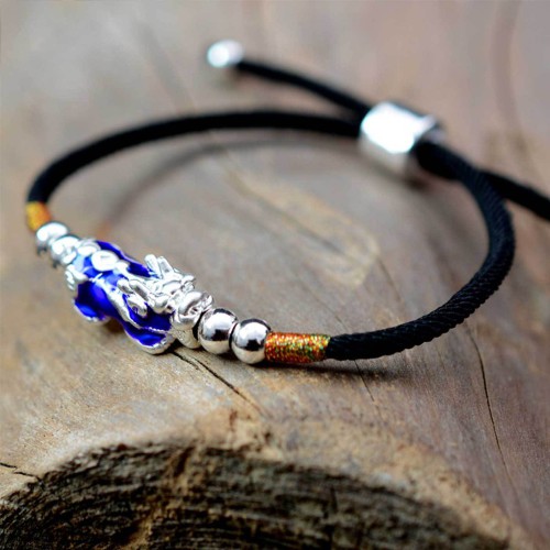 Pixiu brings wealth and protection, while silver enhances clarity and focus