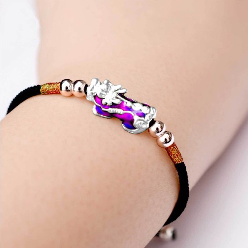 Pixiu brings wealth and protection, while silver enhances clarity and focus
