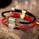 Aventurine attracts prosperity and the red string enhances confidence and positive energy Aventurine attracts prosperity and the red string enhances confidence and positive energy