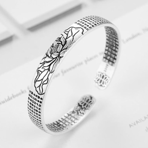 The lotus symbolizes enlightenment, wisdom, and spiritual growth The lotus symbolizes enlightenment, wisdom, and spiritual growth