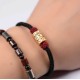 The red string provides good luck and protection against negative energy