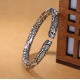 The dragon symbolizes strength and protection, while the silver promotes personal empowerment