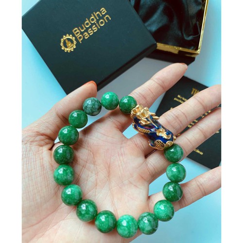 Jade attracts abundance, while Pixiu offers protection and wealth Jade attracts abundance, while Pixiu offers protection and wealth