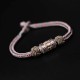The red string is a symbol of protection, warding off negative energy, and attracting good fortune The red string is a symbol of protection, warding off negative energy, and attracting good fortune
