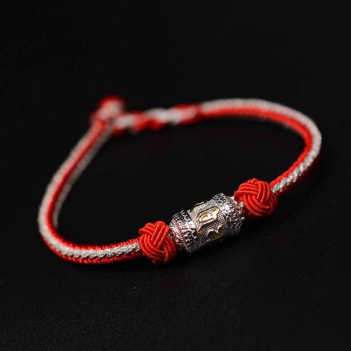 The red string is a symbol of protection, warding off negative energy, and attracting good fortune The red string is a symbol of protection, warding off negative energy, and attracting good fortune