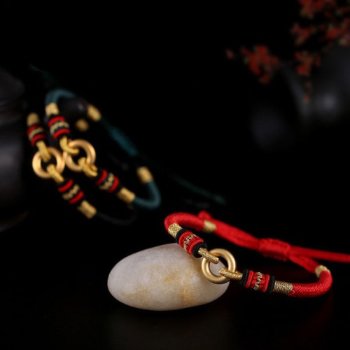 Dragon knots provide protection, while the bracelet symbolizes friendship and good fortune Dragon knots provide protection, while the bracelet symbolizes friendship and good fortune
