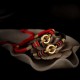 Dragon knots provide protection, while the bracelet symbolizes friendship and good fortune Dragon knots provide protection, while the bracelet symbolizes friendship and good fortune