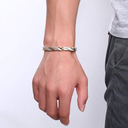 The dragon scale design symbolizes strength and protection, while magnetic therapy promotes vitality