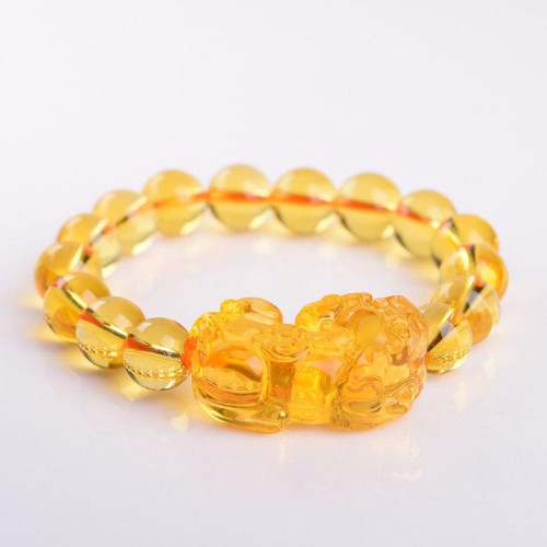Citrine promotes wealth, and the Pixiu provides protection and good fortune Citrine promotes wealth, and the Pixiu provides protection and good fortune