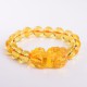 Citrine promotes wealth, and the Pixiu provides protection and good fortune Citrine promotes wealth, and the Pixiu provides protection and good fortune