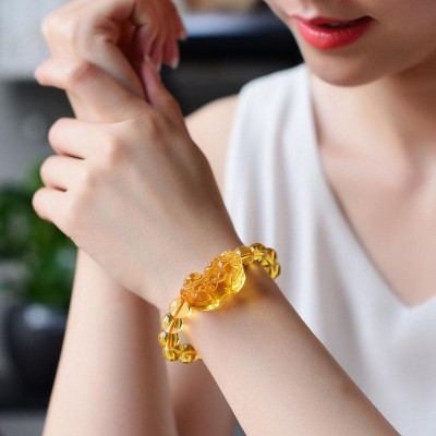Citrine promotes wealth, and the Pixiu provides protection and good fortune