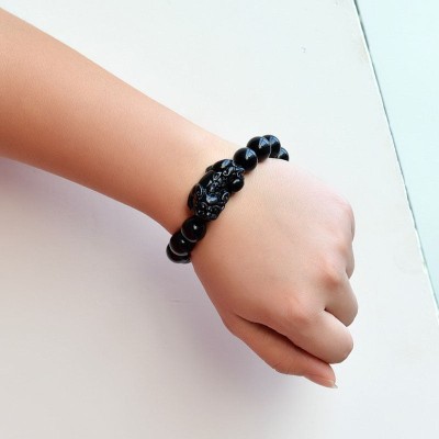 Black Obsidian shields against negativity, while Pixiu attracts wealth and success