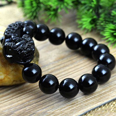 Black Obsidian shields against negativity, while Pixiu attracts wealth and success