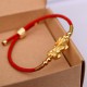 The red string and Pixiu attract wealth, good fortune, and financial prosperity The red string and Pixiu attract wealth, good fortune, and financial prosperity
