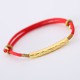 The red string brings good luck and protection, aligned with Tibetan Buddhist teachings The red string brings good luck and protection, aligned with Tibetan Buddhist teachings