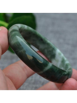 Jade symbolizes prosperity, protection, and emotional balance