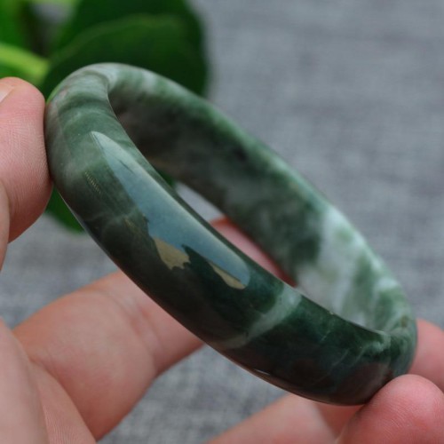 Jade symbolizes prosperity, protection, and emotional balance Jade symbolizes prosperity, protection, and emotional balance