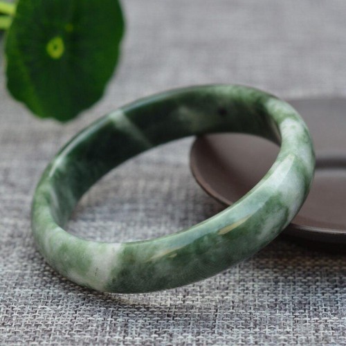 Jade symbolizes prosperity, protection, and emotional balance Jade symbolizes prosperity, protection, and emotional balance