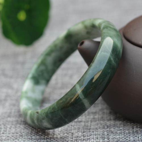Jade symbolizes prosperity, protection, and emotional balance Jade symbolizes prosperity, protection, and emotional balance