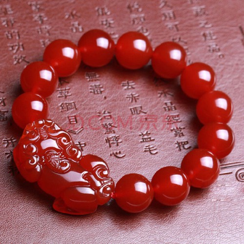 Red Agate attracts wealth and abundance, and the Pixiu provides protection and good fortune Red Agate attracts wealth and abundance, and the Pixiu provides protection and good fortune