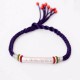 The red string protects against negative influences, while the mantra brings good luck The red string protects against negative influences, while the mantra brings good luck
