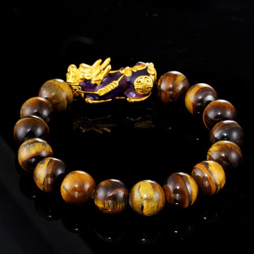 Tiger's Eye attracts wealth and success, while Pixiu provides protection and good fortune Tiger's Eye attracts wealth and success, while Pixiu provides protection and good fortune