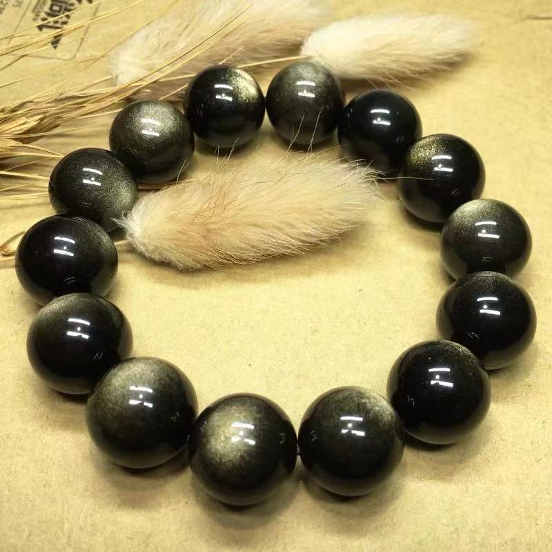 Our Black Gold Obsidian Couple Bracelets Hold Two Eyes
