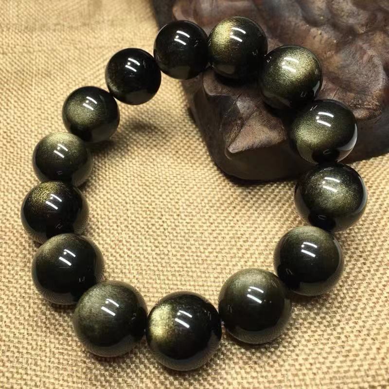 Our Black Gold Obsidian Couple Bracelets Hold Two Eyes