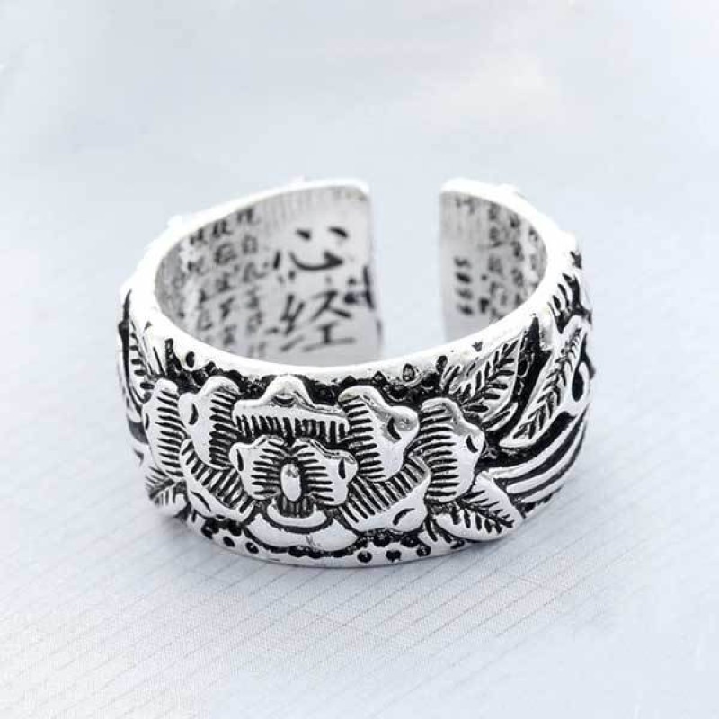 This Lotus Heart Sutra Ring Hides Words Inside