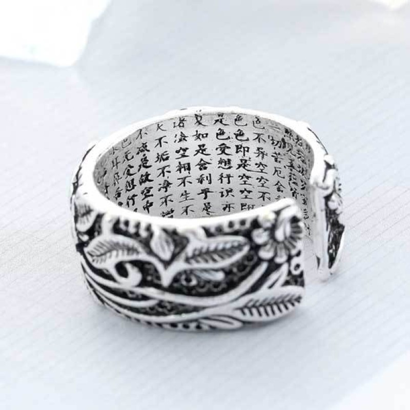 This Lotus Heart Sutra Ring Hides Words Inside