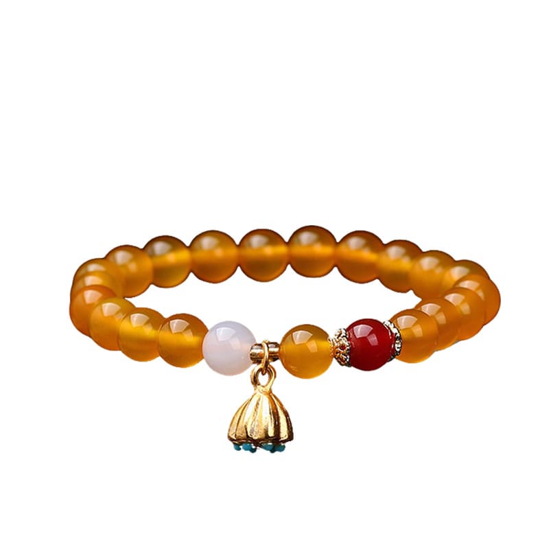 This Natural Red Agate Lotus Pod Bracelet Glows